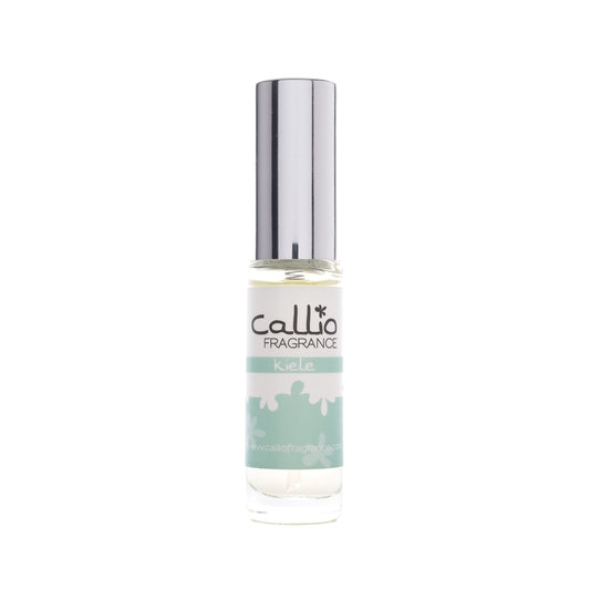 Image of a trave-size bottle of Kiele Perfume on a bright white background. The perfume includes notes of jasmine, gardenia, and tuberose.