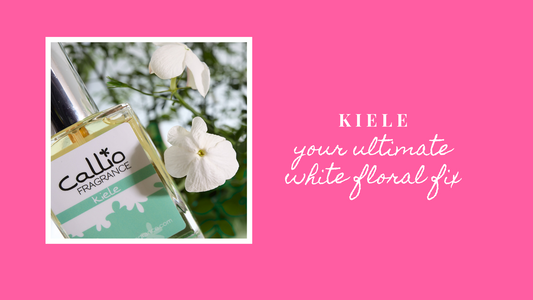 A one-ounce bottle of Kiele with gardenia flowers on a pink banner with the words Kiele your uktimate white floral fix